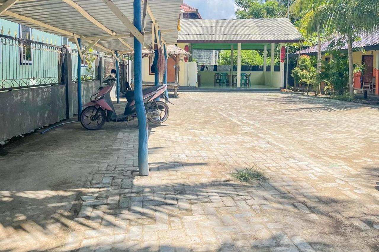 Ekas Beach Guesthouse Mitra Reddoorz Exterior photo